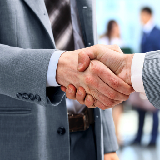 men-in-suits-shaking-hands-for-a-business-deal men-in-suits-shaking-hands-for-a-business-deal